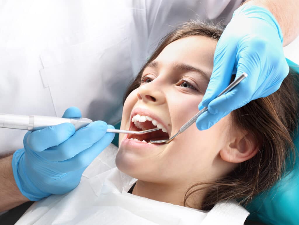 Child in the dental chair dental treatment